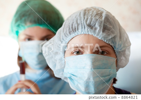 doctors in mask at clinic 8864821