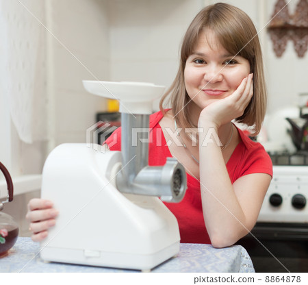 woman with electric mincer woman with electric mincer 8864878