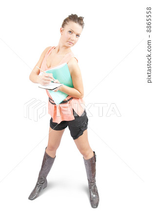 businesswoman writing on a notebook businesswoman writing on a notebook 8865558