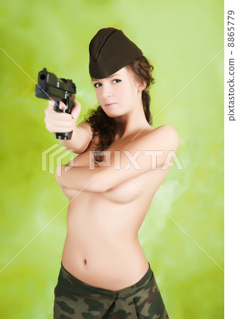 Topless gir with gun 8865779