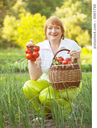 Happy woman with vegetables Happy woman with vegetables 8865786