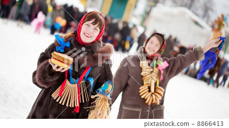 happy girls plays during Shrovetide 8866413