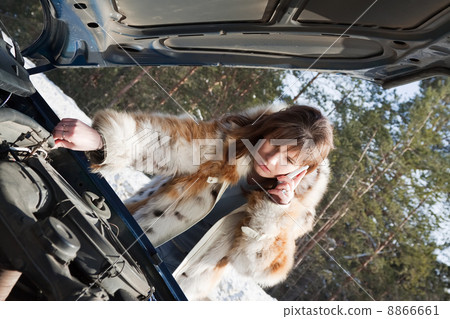 woman with her broken car woman with her broken car 8866661
