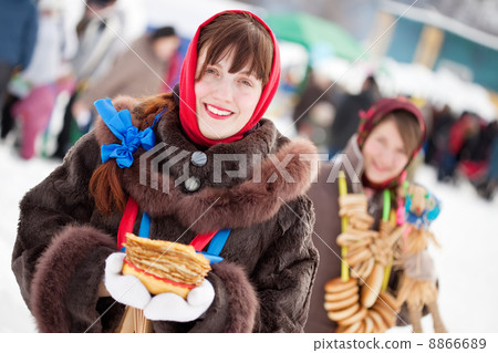 girls with pancake during Shrovetide 8866689