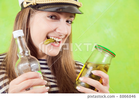 female sailor with bottle of vodka and pickle 8866846