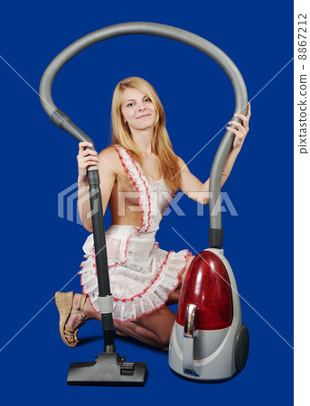 Sexy woman with vacuum cleaner Sexy woman with vacuum cleaner 8867212