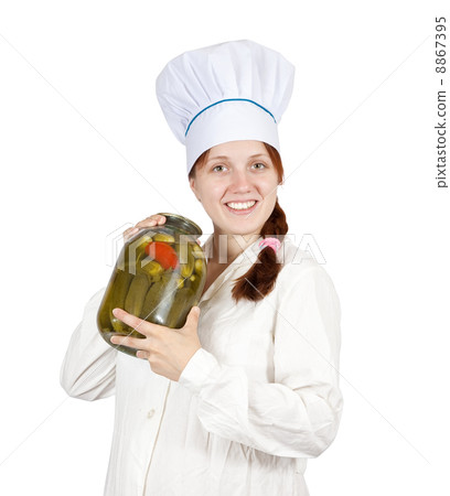 cook woman with pickled products cook woman with pickled products 8867395