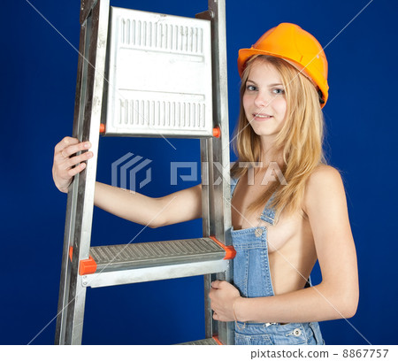 Sexy girl in hardhat with stepladder 8867757