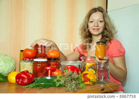 Woman making pickled vegetables Woman making pickled vegetables 8867758