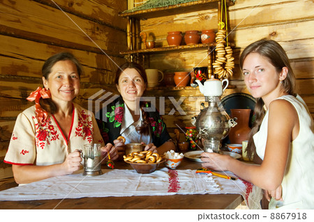 Women near russian samovar Women near russian samovar 8867918