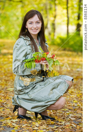 girl in autumn park girl in autumn park 8868134