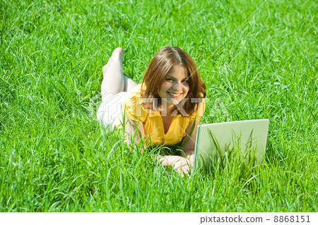 girl relaxing with laptop girl relaxing with laptop 8868151