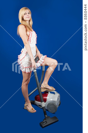 Sexual girl with vacuum cleaner Sexual girl with vacuum cleaner 8868444