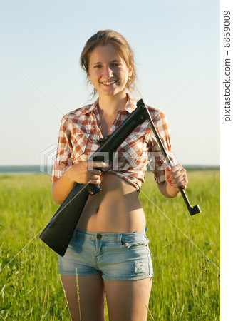 girl holding air rifle girl holding air rifle 8869009