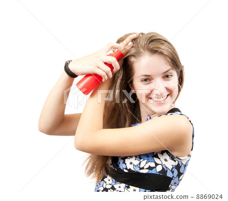 brunette girl with hair spray 8869024