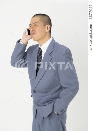 Male speaking on the phone Male speaking on the phone 8877025