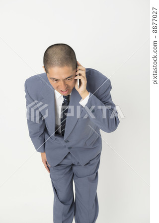 Male apologizing by phone Male apologizing by phone 8877027