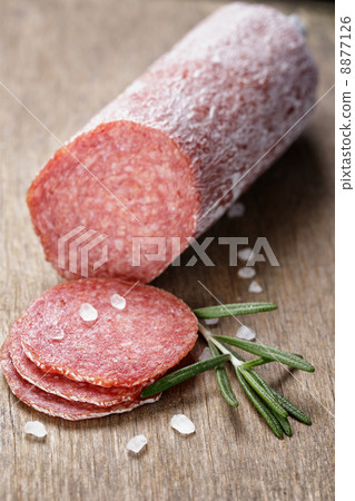 italian salami sausage slices with rosemary and sea salt italian salami sausage slices with rosemary and sea salt 8877126