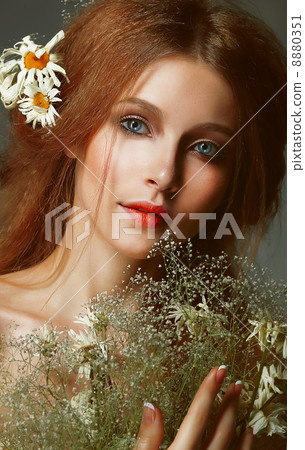 Pure Beauty. Auburn Girl holding Bouquet of Wildflowers. Tenderness Pure Beauty. Auburn Girl holding Bouquet of Wildflowers. Tenderness 8880351