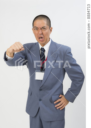 An angry businessman An angry businessman 8884713