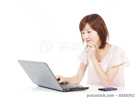A woman enjoying the Internet 8888562