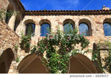 Beautiful medieval patio with roses , Provence, France Beautiful medieval patio with roses , Provence, France 8889057