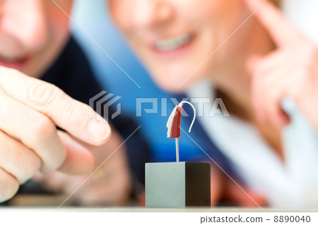 Deaf woman with heraring aid 8890040