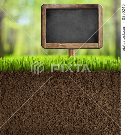 soil in garden with blackboard sign soil in garden with blackboard sign 8890246