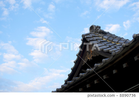 Roof tile of old private house and autumn sky Roof tile of old private house and autumn sky 8890736