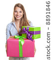 Beautiful woman with two gifts for christmas 8891846