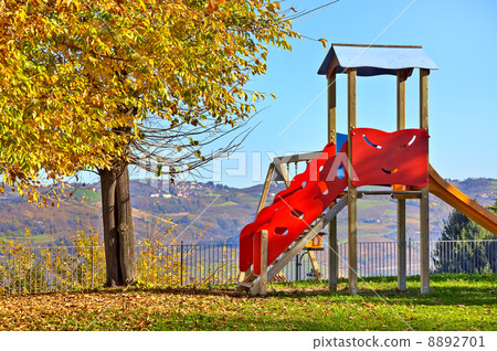 Slide on empty playground. 8892701