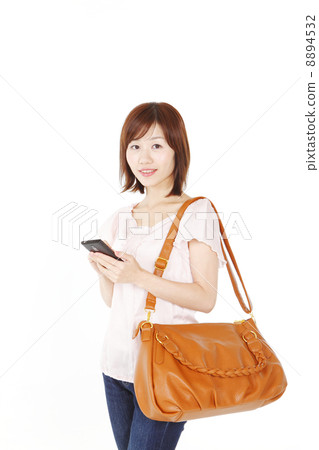 A woman in a shoulder bag A woman in a shoulder bag 8894532