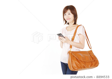 A woman in a shoulder bag A woman in a shoulder bag 8894533