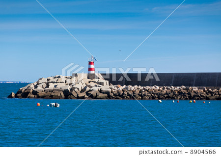 Pier with Lighthouse at Sagres, Portugal Pier with Lighthouse at Sagres, Portugal 8904566