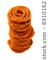 Traditional indian snack - chakali, isolated on white. 8910162