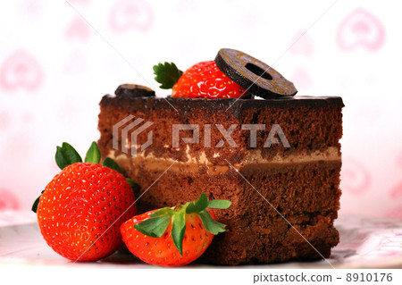 Slice of chocolate cake with strawberries Slice of chocolate cake with strawberries 8910176