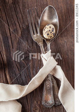 vintage silverware with quail egg 8911345