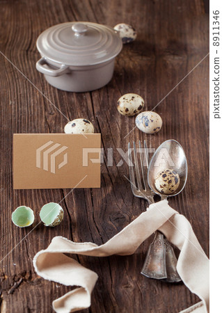 Easter table setting with quail eggs 8911346