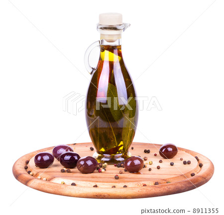 olive vegetable oil in glass and olive vegetable oil in glass and 8911355