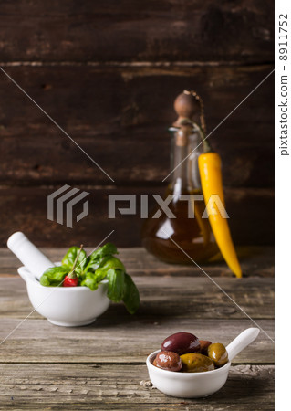 Olives with olive oil and basil Olives with olive oil and basil 8911752