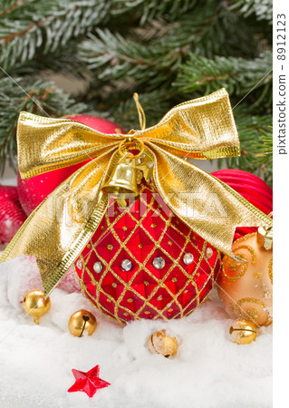 red christmas ball with golden bow red christmas ball with golden bow 8912123