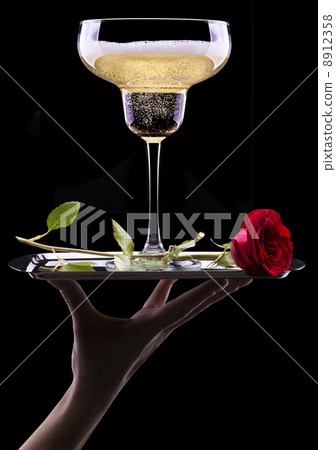 glass of champagne and rose on black glass of champagne and rose on black 8912358