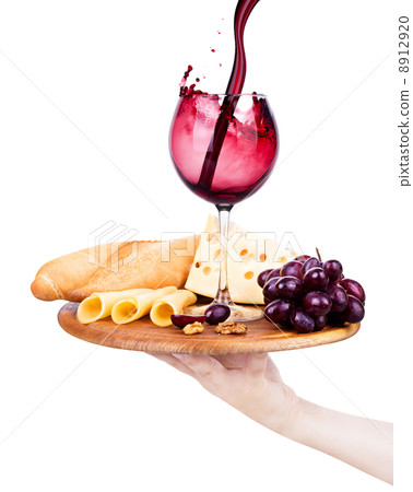 wine and food with waiter hand wine and food with waiter hand 8912920