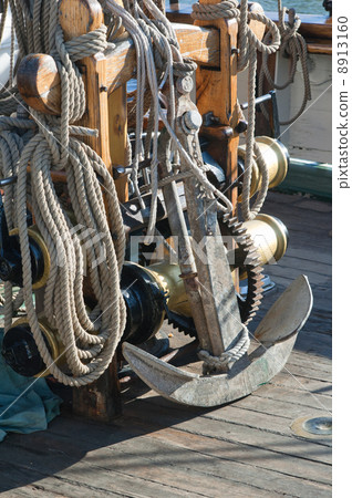 Anchor and rope on a ship deck 8913160