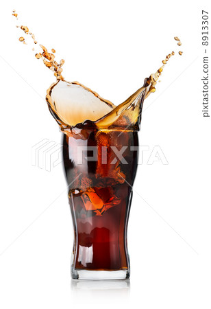 Splash of cola in a glass Splash of cola in a glass 8913307