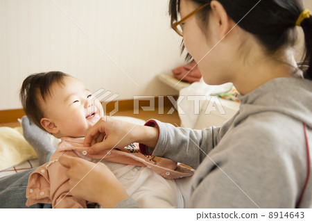 Baby changing clothes Baby changing clothes 8914643