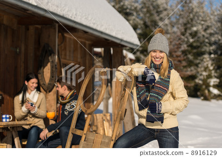 Young woman spend holiday winter show cottage 8916129
