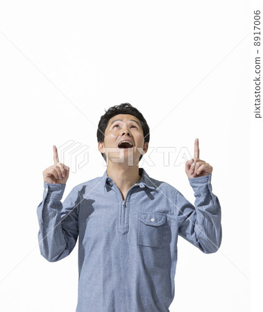 A man pointing up and looking up 8917006