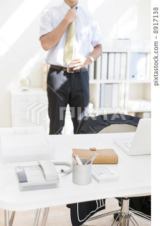 Desk and businessman 8917138