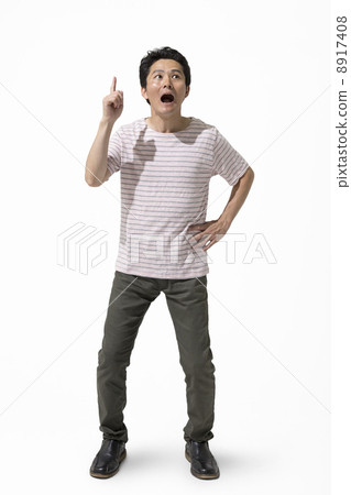 Men standing with their fingers Men standing with their fingers 8917408